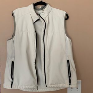 Clique white zip up vest with 2 side pockets.  XL